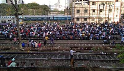 Terrible Tuesday for Mumbaikars as job aspirants stall local train services for hours