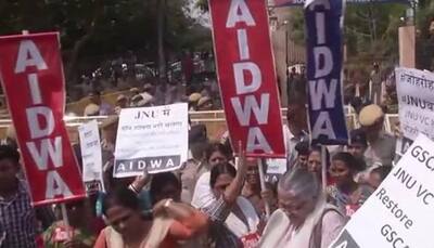 Protests outside police station over molestation charges against JNU professor