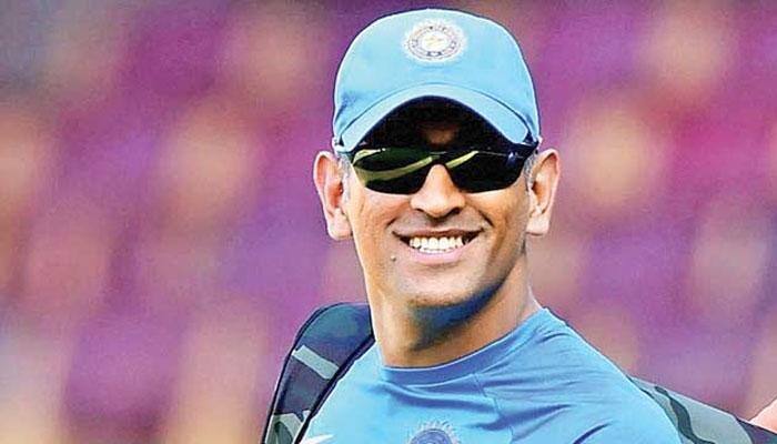 Watch youngster touching MS Dhoni's feet in a heart-warming act
