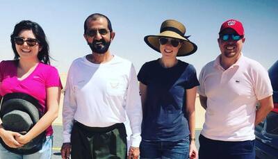 Dubai ruler Sheikh Mohammed bin Rashid Al Maktoum helps tourists pull their car out of the sand, goes viral - Watch