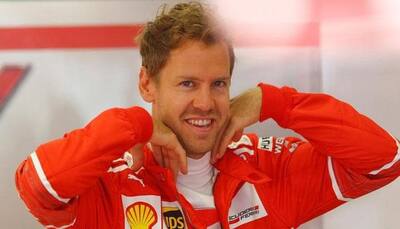 Sebastian Vettel goes fastest on slicks in Australian GP practice