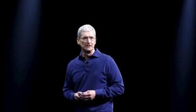 Apple CEO Tim Cook says 'calm heads' needed in looming US, China trade war