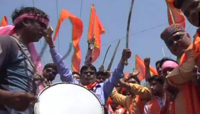 Hindu Yuva Vahini members brandish swords during Ram Navami procession