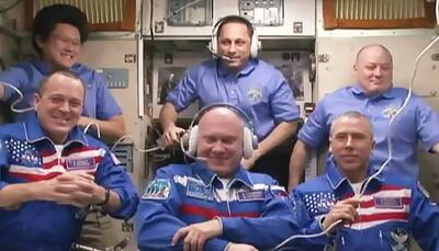 Expedition 56 crew members welcomed aboard the space station