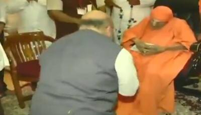 Watch: BJP president Amit Shah visits Siddaganga Mutt, meets Shivakumara Swami