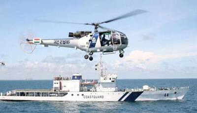 Coast Guard pilot, who suffered injuries in chopper crash, dies
