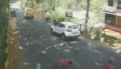 Caught on camera: Kerala woman lying on busy road, none comes to her rescue