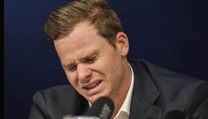 Watch: Contrite Steve Smith breaks down in tears on return to Australia 