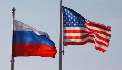Russian diplomats expelled from the United States arrive home