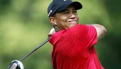 Golf: Tiger proud of salvaging round in Masters return