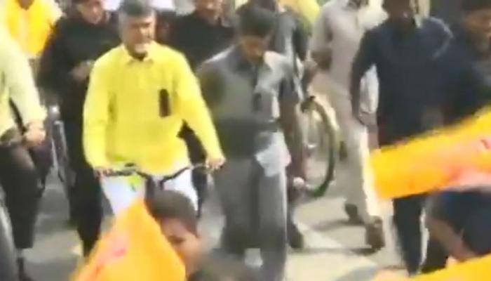  Chandrababu Naidu rides cycle to demand special status for Andhra Pradesh