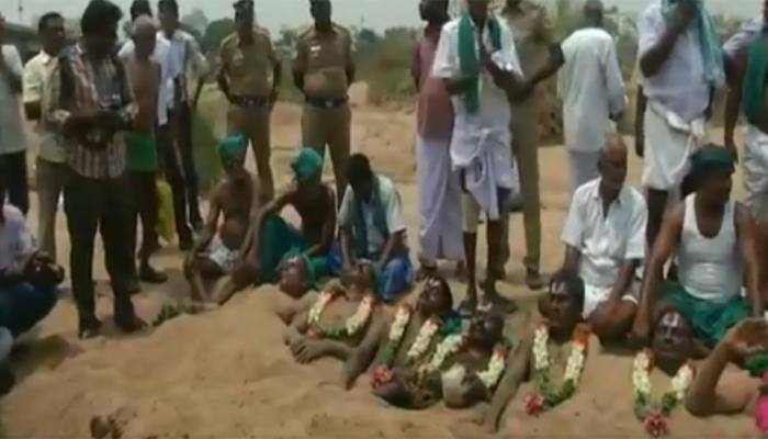 Tamil Nadu farmers partially bury themselves in sand demanding formation of Cauvery Management Board - Video