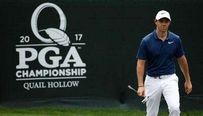 Rory McIlroy leads with Matt Kuchar in second round of Augusta National