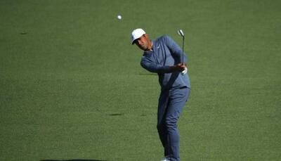 Golf: Finau battles through pain to stay in Masters contention