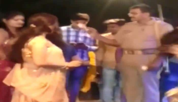 Caught On Camera Up Cop Shower Notes On Dancers During Event In Unnao Uttar Pradesh News