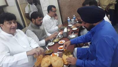 BJP leader claims Congress men had meal at hotel before Rajghat fast, shares pic