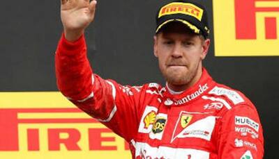 Formula One: Sebastian Vettel snatches pole position in Ferrari one-two at Chinese GP