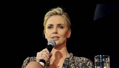 Charlize Theron says she may leave the US because of racism