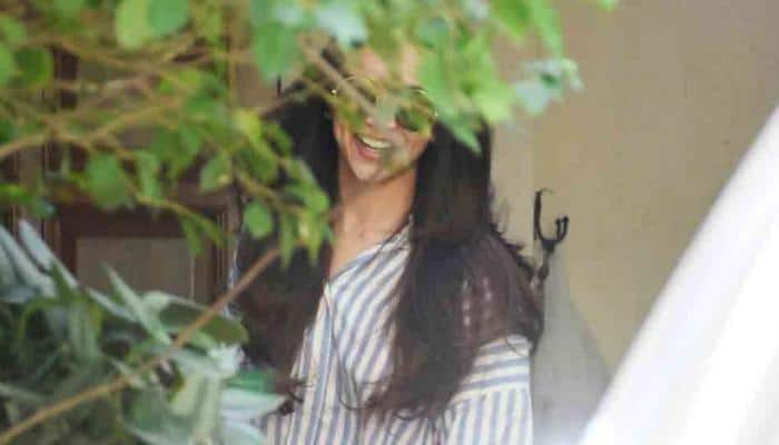 Deepika Padukone cracks up a pretty laugh as she gets snapped outside a salon