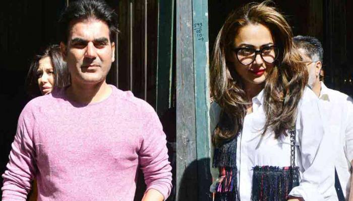 Arbaaz Khan, Amrita Arora chill out at Pali Beach resort — See photos