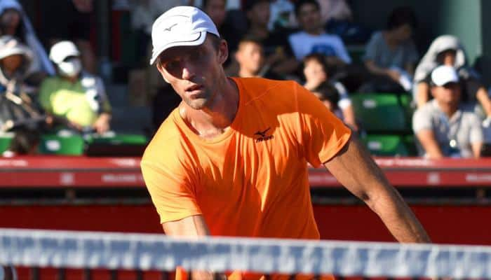 Karlovic beats former Barcelona Open tennis champion Robredo