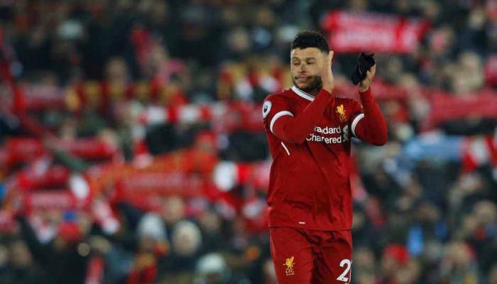 Liverpool's English midfielder Oxlade-Chamberlain's World Cup in doubt after injury