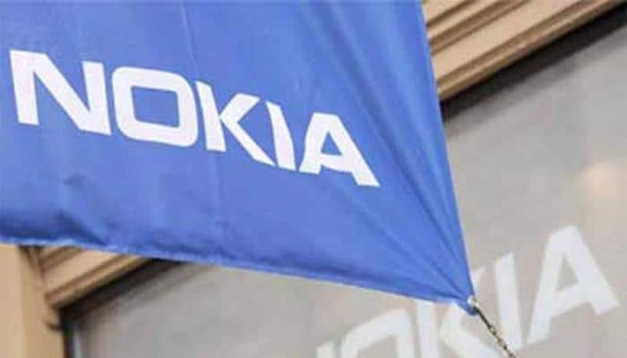 Nokia posts sharp quarterly profit fall, sees 5G accelerating