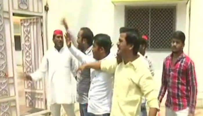 SP workers fling tomatoes at UP minister&#039;s house after his &#039;alcohol&#039; remark against Yadavs, Rajputs