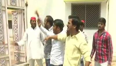 SP workers fling tomatoes at UP minister's house after his 'alcohol' remark against Yadavs, Rajputs