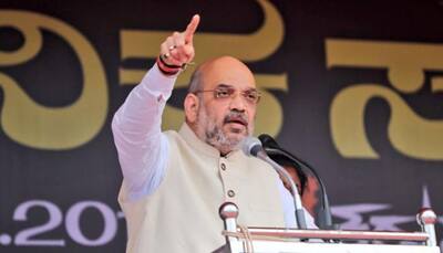  Amit Shah attacks Rahul Gandhi over his meeting with Lalu  Prasad Yadav, calls Congress chief 'double-faced'