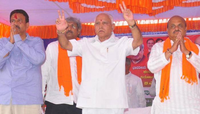 Riding on &#039;Modi wave&#039;, BJP will win Karnataka polls with absolute majority: Yeddyurappa