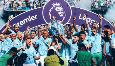 Manchester City lift Premier League trophy as Huddersfield celebrate precious point