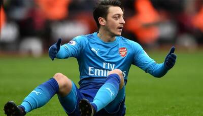Mesut Ozil joins Germany injury list, but vows to be at World Cup