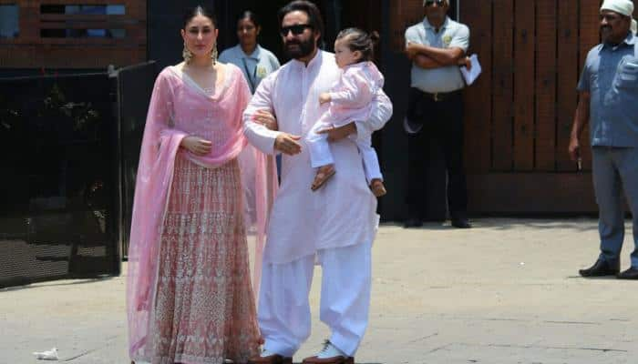 Kareena Kapoor, Saif Ali Khan and little Taimur go twinning in pink for Sonam Kapoor&#039;s wedding! First photos out