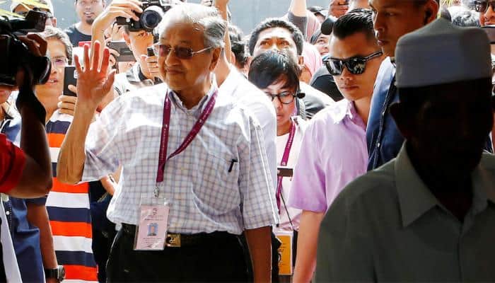 Mahathir Mohamad claims election win over ruling coalition in Malaysia