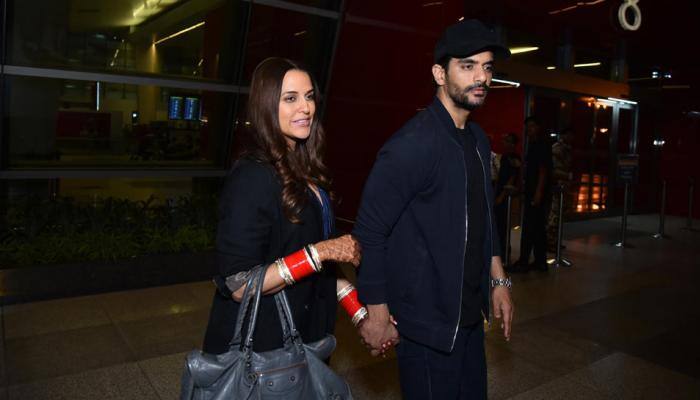 Newly-weds Neha Dhupia, Angad Bedi leave for honeymoon, to throw grand reception in Mumbai soon