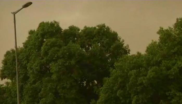 Dust storm, squall hits national capital region, brings mercury down