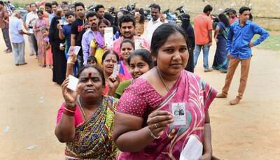 Caution ahead of Karnataka poll results, inflation keep equities flat