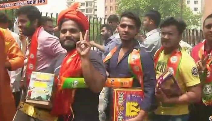 Karnataka election results: BJP workers celebrate in Delhi