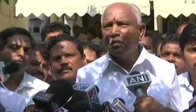 Karnataka: BJP's CM face BS Yeddyurappa meets Governor, stakes claim to form government 