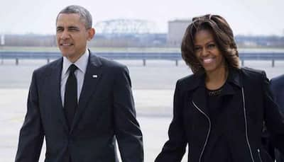 Netflix says it has signed Barack and Michelle Obama