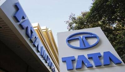 Tata Motors fourth-quarter profit halves, lags estimate