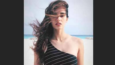 Disha Patani looks alluring by posing in black swimwear—Check out pics
