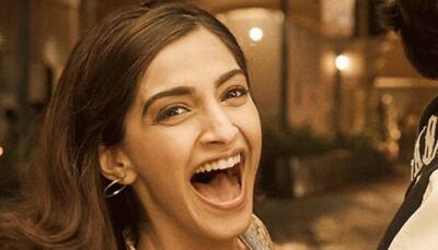 Sanju: Sonam Kapoor has a good laugh as she twists Ranbir Kapoor's arm in a new poster