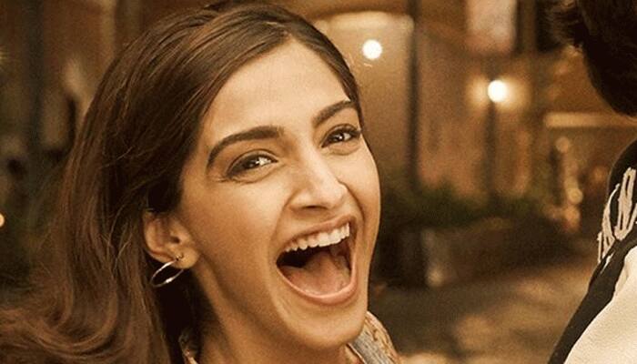 Sanju: Sonam Kapoor has a good laugh as she twists Ranbir Kapoor's arm in a new poster