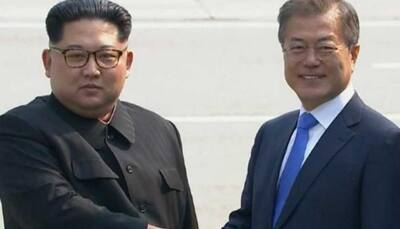Two Korean leaders meet in a surprise summit in border truce village