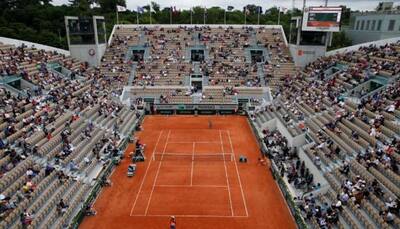 No need for 'Quiet Please' at French Open - stands half empty