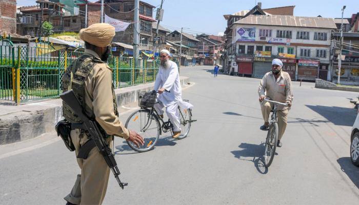 Curfew continues in parts of Shillong after night-long violence; Army conducts flag march