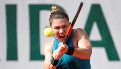 French Open: Simona Halep subdues Andrea Petkovic after tight early tussle