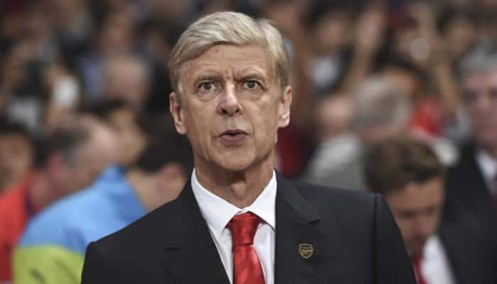 Soccer: Arsene Wenger cautious of &#039;&#039;crazy challenge&#039;&#039; as he ponders future